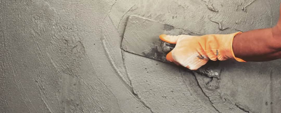 Ile cementu na 100m2 tynku? Sprawdź, aby uniknąć błędów w kosztach